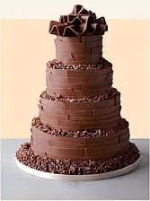 Tiered chocolate cake with chocolate curls